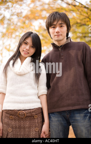 Young couple looking at camera Stock Photo