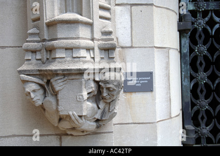 New Haven, CT. Yale University Stone carving and sign in front of an entrance to Sterling Memorial Library. Stock Photo