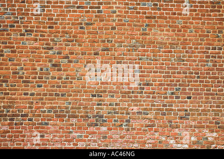 Colonial Brick A frame filled with old 18th century red brick wall of an old plantation barn Stock Photo