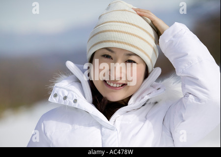 Young woman smiling looking at camera Stock Photo