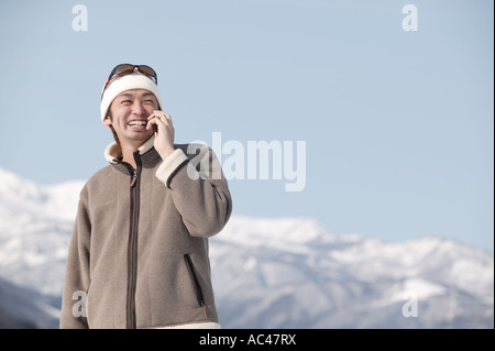 Young man using mobile phone Stock Photo