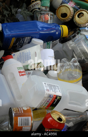 Cans and plastic bottles in a domestic recycling bin, awaiting to go for recycling. Stock Photo