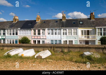 Colourful traditional Edwardian seaside homes boats beach sea wall Whitstable Kent England UK 2000s 2007  HOMER SYKES Stock Photo