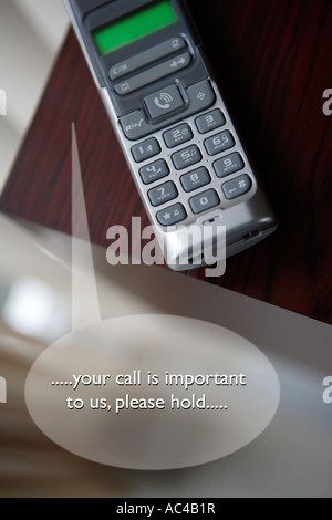 Telephone with speech bubble indicating Call Centre Delays Stock Photo