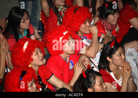 South Korean (Republic) fans watching 2006 World Cup Finals drawn match vs France, Cafe de Paris, London Stock Photo