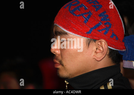 South Korean (Republic) fans watching 2006 World Cup Finals drawn match vs France, Cafe de Paris, London Stock Photo