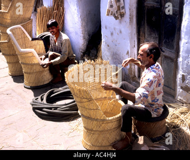India Rajasthan man  Shops Marketplace Bazaar Chair bamboe  furniture wicker Stock Photo
