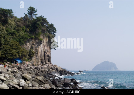 Coastal view near Jeongbang waterfall on the coast of Jeju island in South Korea. Stock Photo