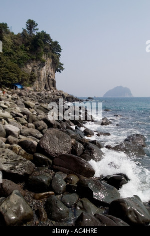 Coastal view near Jeongbang waterfall on the coast of Jeju island in South Korea. Stock Photo