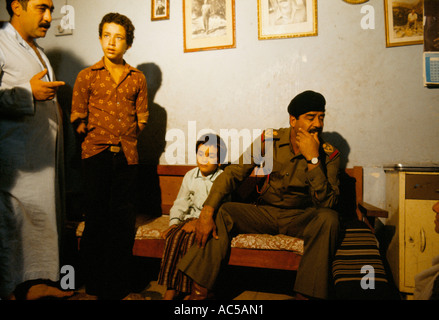 SADDAM HUSSEIN SADDAM HUSSEIN SEATED WITH FAMILY IN THEIR HOME BAGHDAD JULY 1982