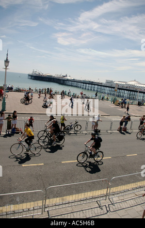 sponsored riders on Brighton promenade at finish of London to Brighton bike ride Stock Photo