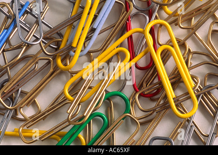 Coloured paper clips against white background Stock Photo
