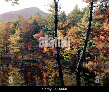 Red Eagle Pond in New Hampshire showing autumnal colors Stock Photo