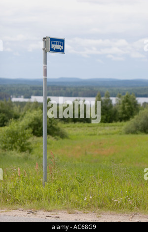 Empty Finnish bus stop traffic sign at countryside ( Bus stop for long distance traffic ) , Finland Stock Photo