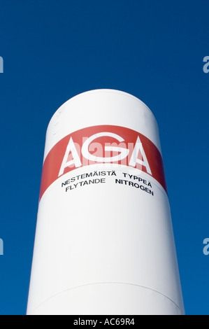 Tank of pressurized liquid nitrogen against blue sky , texts in Finnish and Swedish , Finland Stock Photo