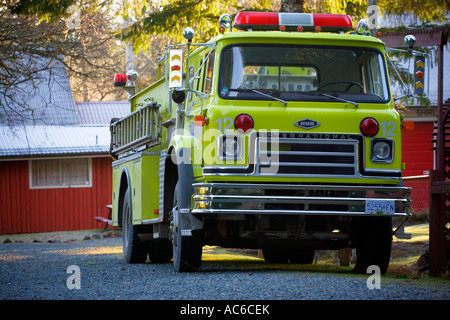 old firefighter truck in front of shirley community hall in Sooke british columbia canada Stock Photo