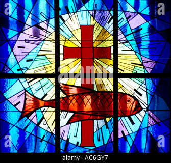 Dubai UAE St Marys Catholic Church Stained Glass Window Symbols of Fish and Cross Stock Photo