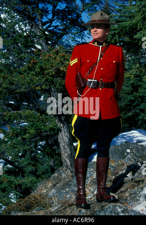 1 one adult man male Royal Canadian Mounted Police RCMP aka Canadian Mountie on duty in Canadian Rockies in Banff in Alberta Canada North America Stock Photo