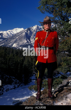 1 one adult man male Royal Canadian Mounted Police RCMP aka Canadian Mountie on duty in Canadian Rockies in Banff in Alberta Canada North America Stock Photo