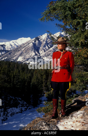 1 one adult woman female Royal Canadian Mounted Police RCMP aka Canadian Mountie on duty in Canadian Rockies in Banff in Alberta Canada North America Stock Photo