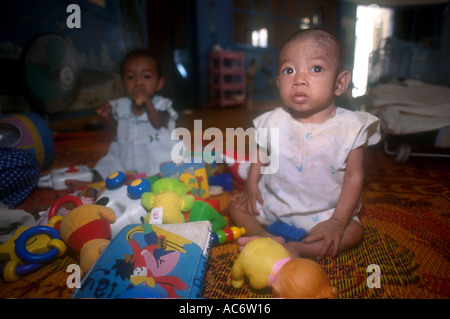 Children and babies suffering from full blown AIDS and HIV in an orphanage in Phnom Penh Cambodia Nutrition Centre Center Phnom Stock Photo