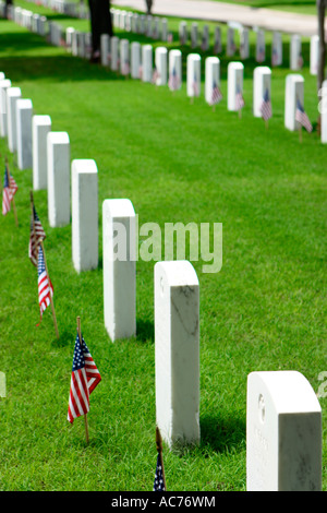 Decorated tombstones at Fort Sam Houston National Cemetary San Antonio Texas USA Stock Photo