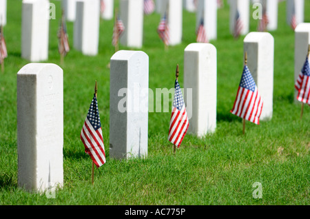 Decorated tombstones at Fort Sam Houston National Cemetary San Antonio Texas USA Stock Photo