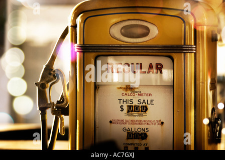 Old fashioned American yellow gas pump Stock Photo