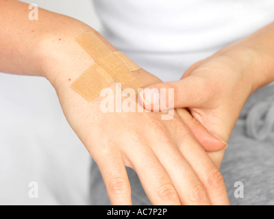 Young Woman Applying Plaster Model Released Stock Photo