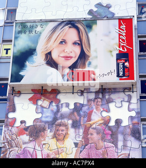 Meg Ryan Nescafe giant billboard on the street of Kobe Japan. Foreign celebrity used for advertising. Stock Photo