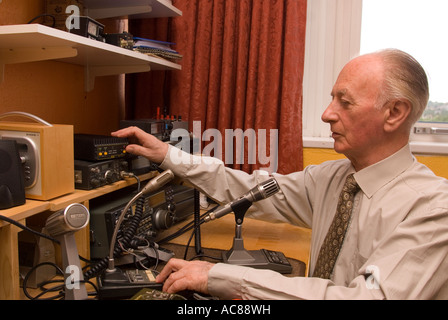 Blind man indulging his hobby for amateur radio, London, UK. Stock Photo