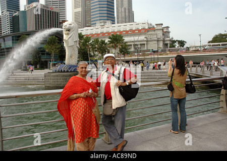 SMA79116 Mr and Mrs Shashikant Mehta Old Indian couple standing near Merlion statue in Merlion park Singapore Model Release Stock Photo