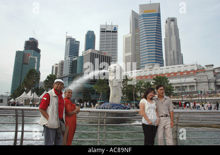 SMA79117 Old Indian couple standing near Merlion statue in Merlion park Singapore Model Release only for Indian couple Stock Photo
