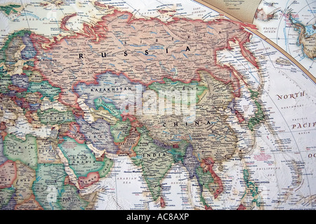 A view covering many nations, including Russia, China, Israel, and many more, on a fine, detailed and colorful World map. Stock Photo
