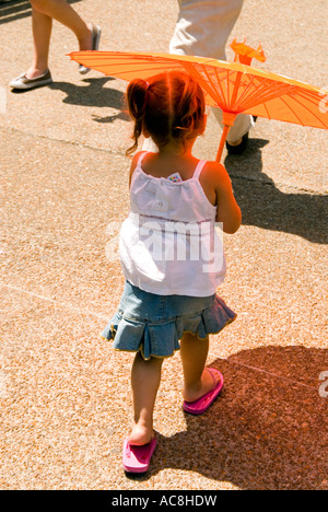 Little Girl with Orange Umbrella 3 Stock Photo
