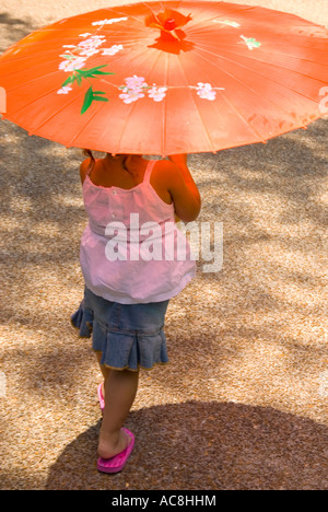 Little Girl with Orange Umbrella 2 Stock Photo