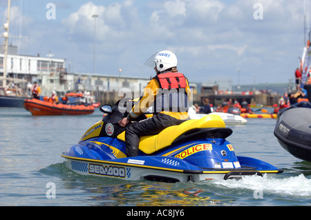 Police Jetski on patrol in Weymouth harbour in Dorset Britain UK Stock Photo