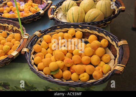 apricot (Prunus armeniaca), and melons (Cucumis melo)  at a market, France, Provence Stock Photo