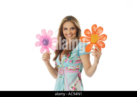 yong woman holding decoration blossoms Stock Photo