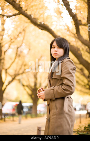 Young woman standing Stock Photo