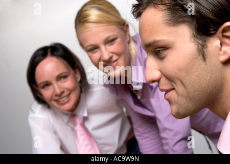 Young businessmann and women discussing Stock Photo