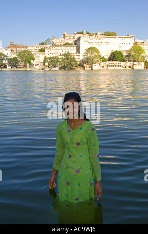 Rajasthani Woman Washing Clothes At The Bathing Ghats At Udaipur Stock