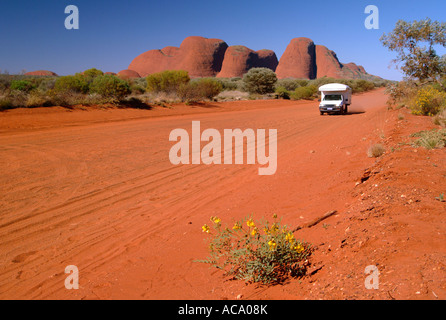 4WD driving on a dirt road in Uluru - Kata Tjuta National Park, Northern Territory, Australia Stock Photo