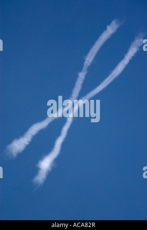 Vapour trails in the sky Stock Photo