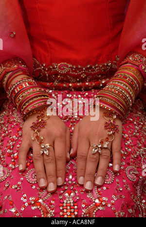 Sikh woman during marriage ceremony in temple or gurdwara Hounslow Middlesex UK Stock Photo