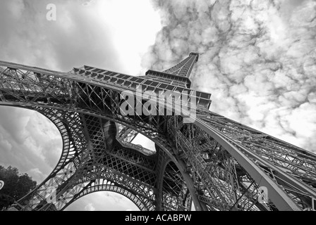 PARIS. A dramatic black and white view of the Eiffel Tower under stormy skies. Stock Photo