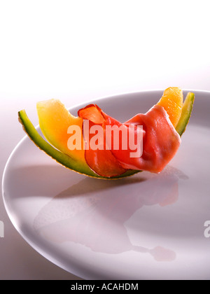 Honeydew melon with ham from Parma Stock Photo