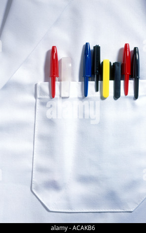 A selection of coloured pens in a doctors white lab coat pocket Stock Photo