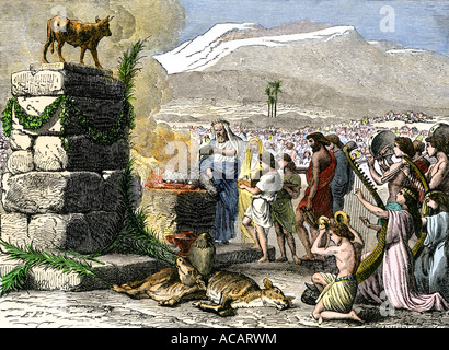 Animal sacrifice to worship a golden calf in Biblical times. Hand-colored woodcut Stock Photo