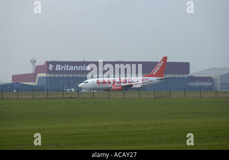 Easyjet Boeing taxis along the runway at Luton airport UK Stock Photo